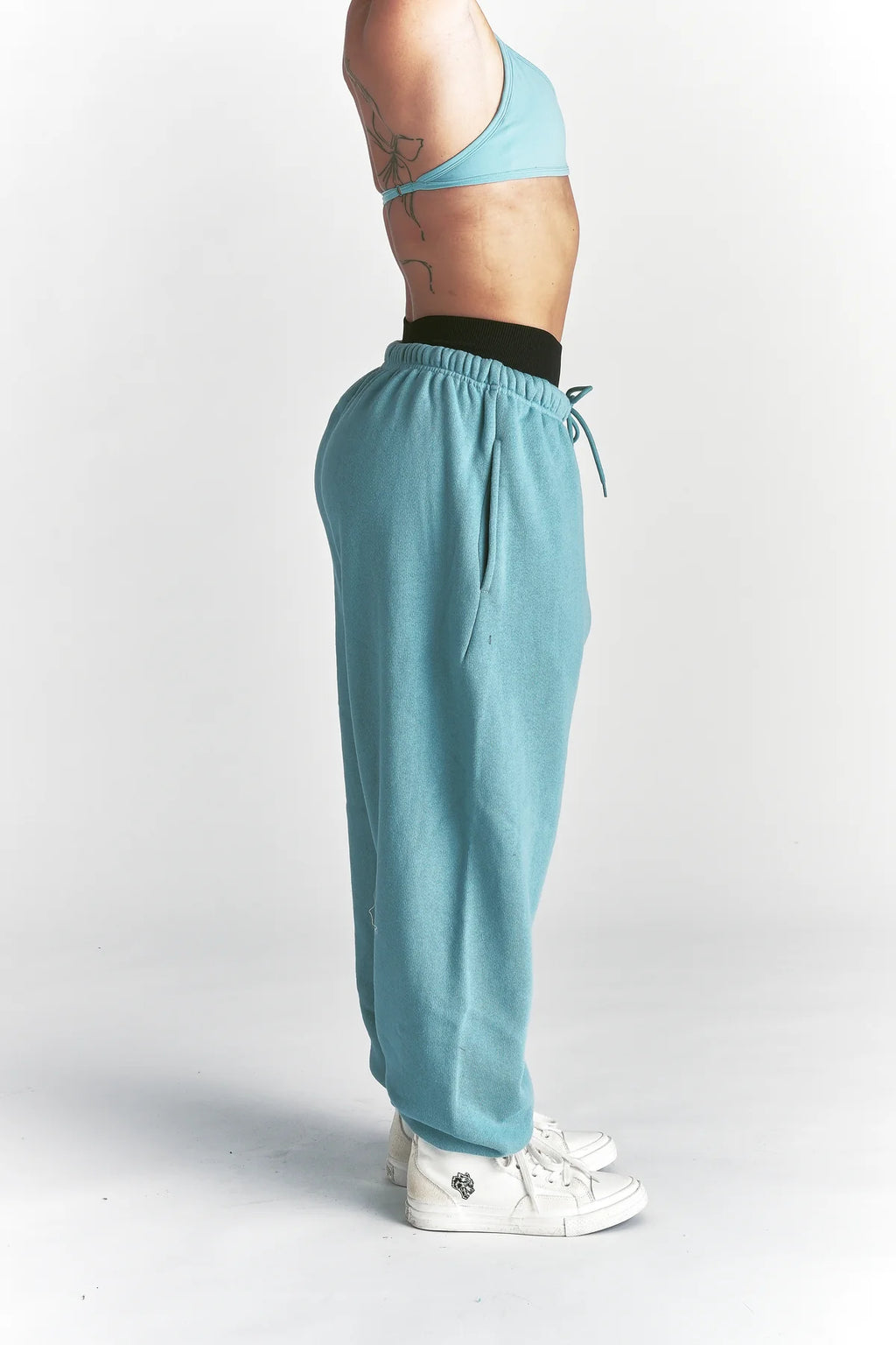 CURSIVE WOLVES PREMIUM LOUNGER SWEAT PANTS IN DUSTY TURQUOISE