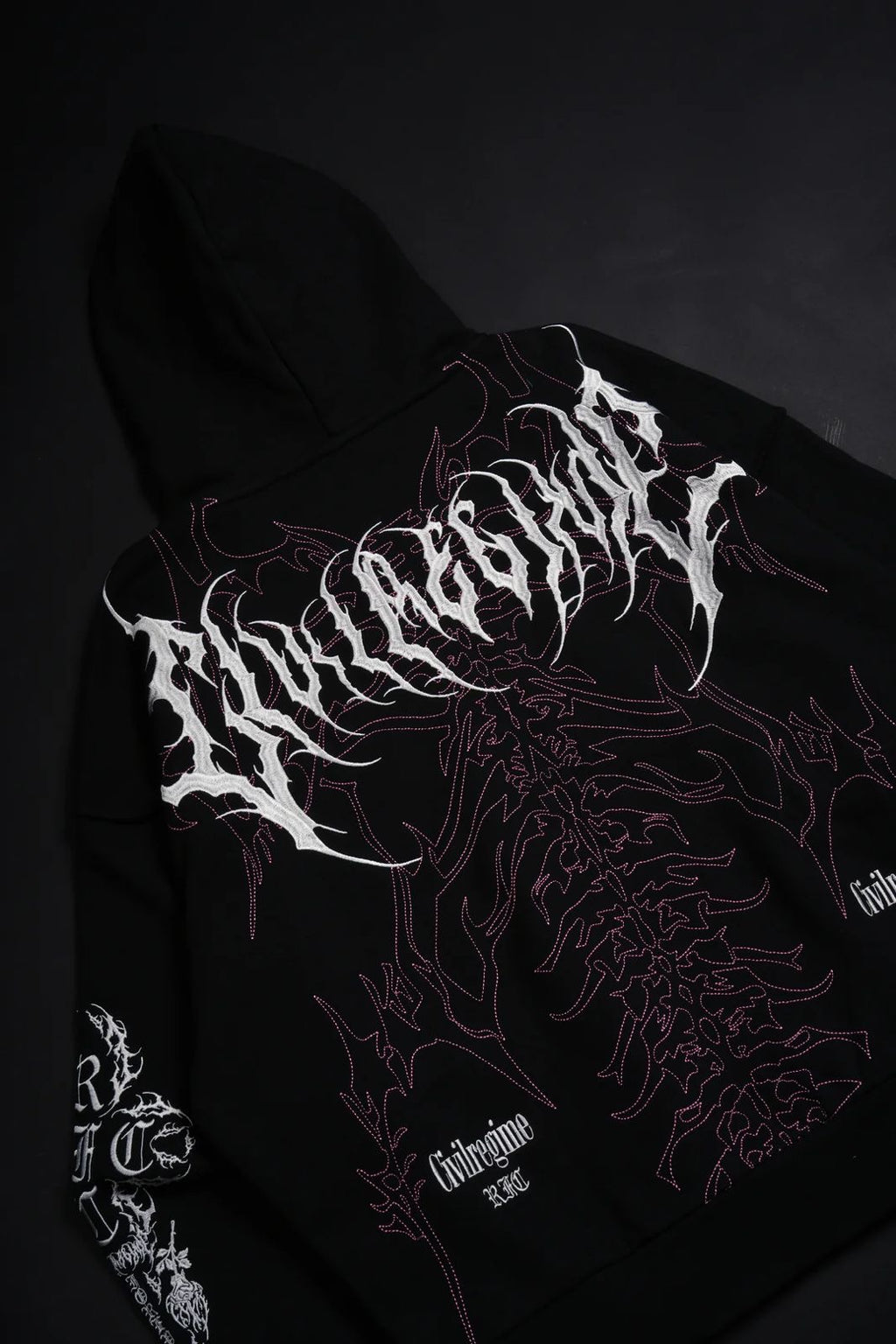 SURGING THROUGH THE BLOSSOMS OUTLIERS DISTRESSED ZIP UP HOODIE IN BLACK