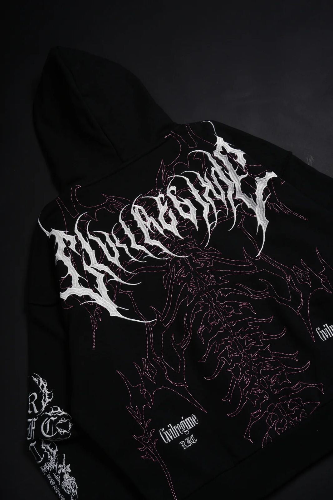 SURGING THROUGH THE BLOSSOMS OUTLIERS DISTRESSED ZIP UP HOODIE IN BLACK