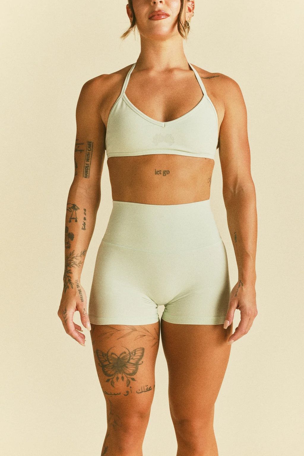IYKYK WOLVES "EMMA" ENERGY SHORTS IN HONEYDEW
