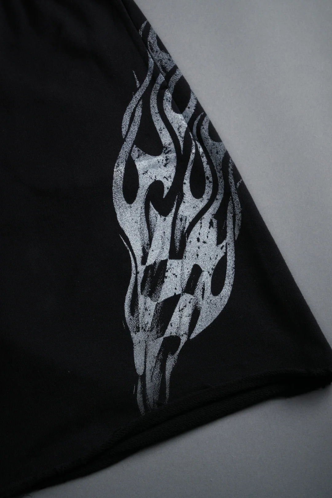 RACE INFERNO GRUNGE OVERSIZED RAW HEM POST LOUNGE SWEAT SHORTS IN BLACK