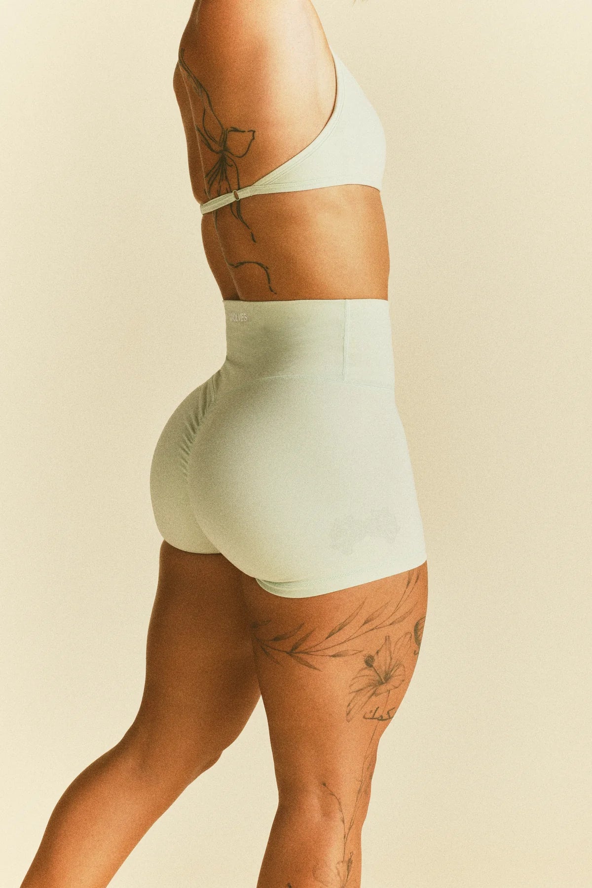 IYKYK WOLVES "EMMA" ENERGY SHORTS IN HONEYDEW