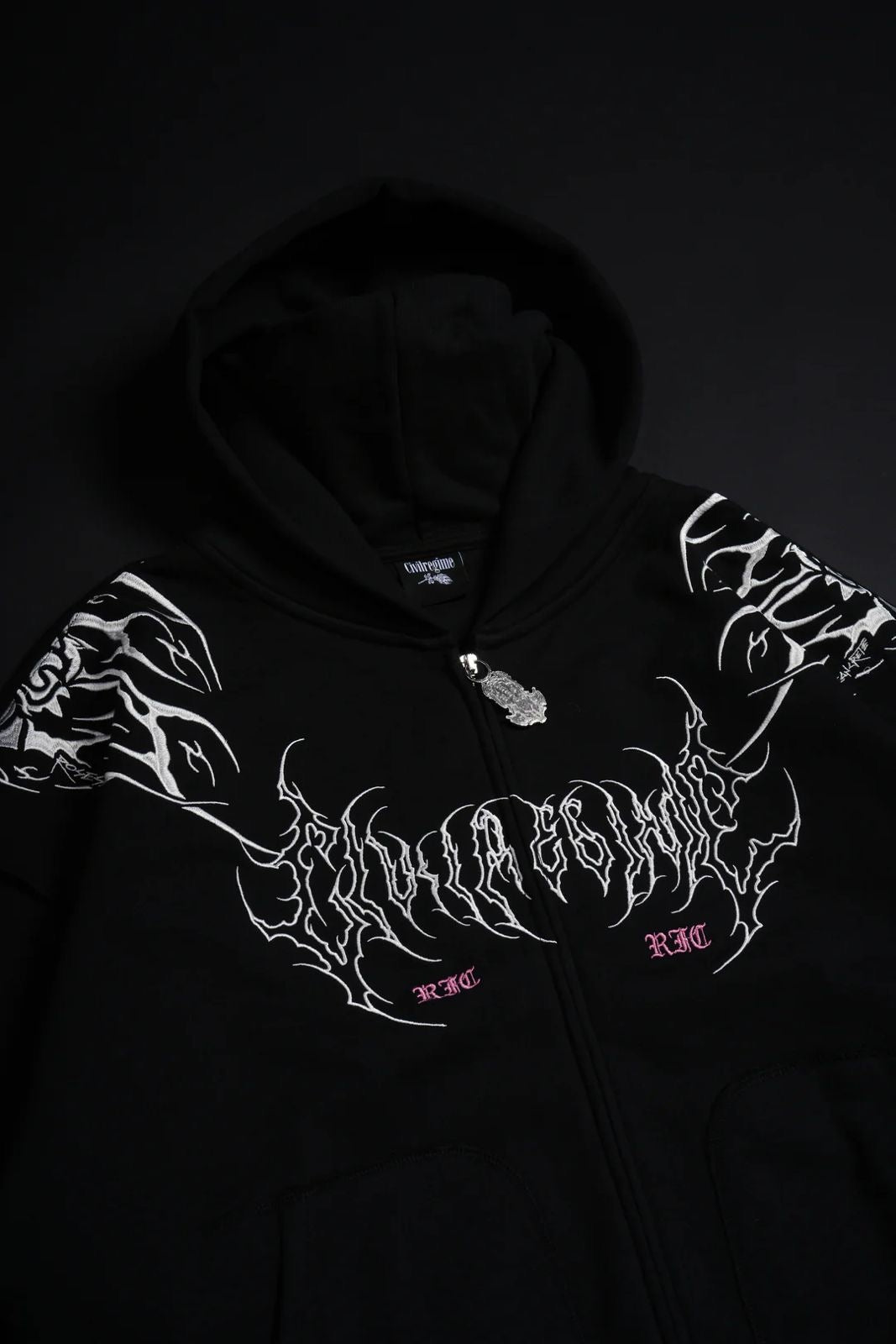 SURGING THROUGH THE BLOSSOMS OUTLIERS DISTRESSED ZIP UP HOODIE IN BLACK
