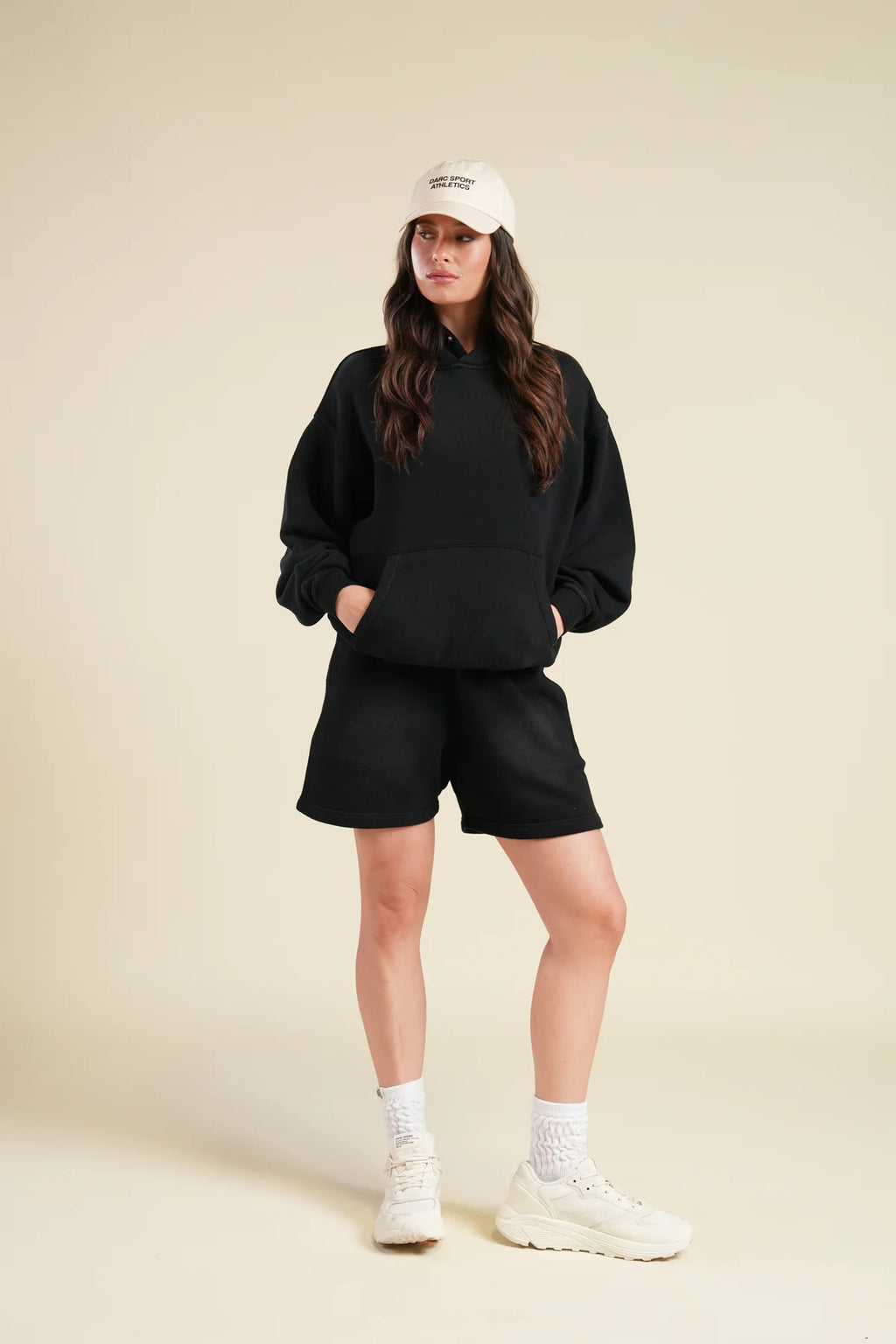 BACK CURSIVE WOLVES "PIERCE" HOODIE IN BLACK SUN FADE