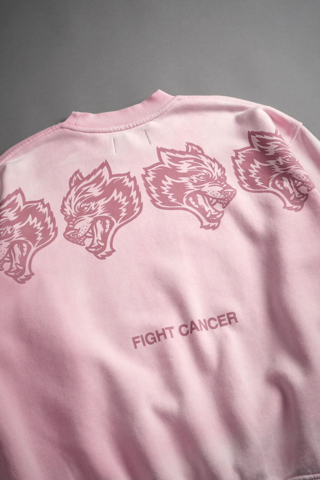 WOLVES HAVE YOUR BACK LONDON UNISEX CREWNECK IN CHERRY BLOSSOM HALO WASH