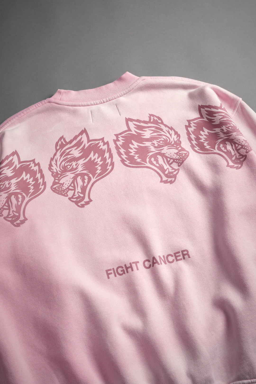 WOLVES HAVE YOUR BACK LONDON UNISEX CREWNECK IN CHERRY BLOSSOM HALO WASH