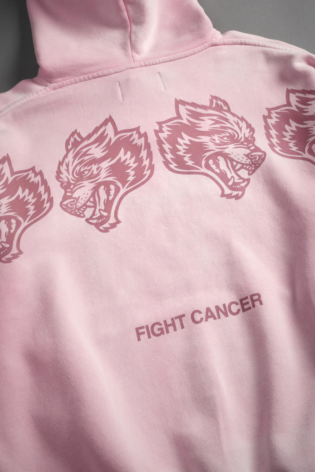 WOLVES HAVE YOUR BACK UNISEX "BISHOP" HOODIE IN CHERRY BLOSSOM HALO WASH