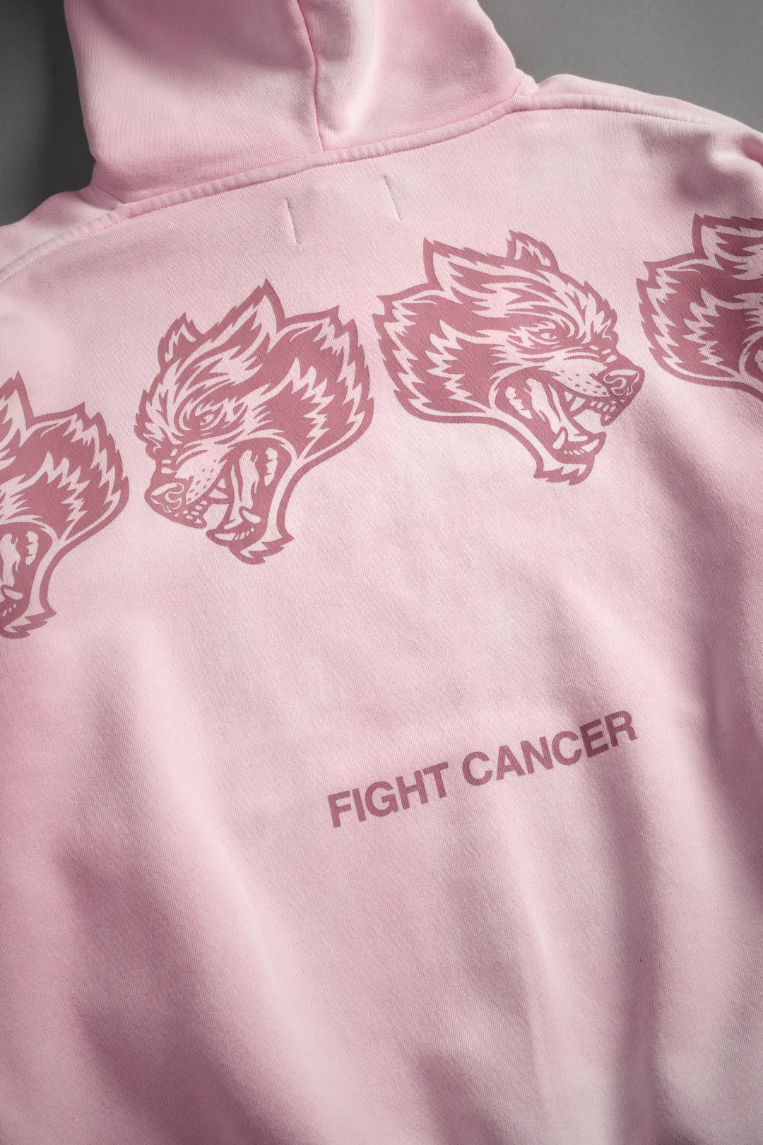 WOLVES HAVE YOUR BACK UNISEX "BISHOP" HOODIE IN CHERRY BLOSSOM HALO WASH