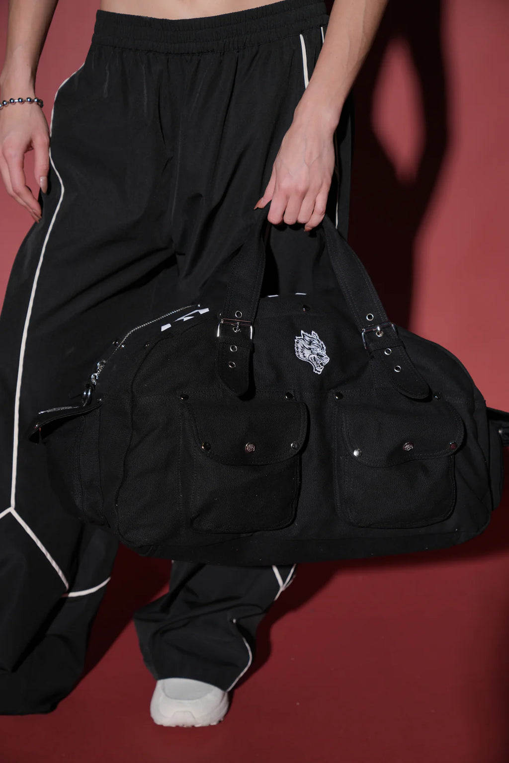 OUR MANTRA DUFFLE SHOULDER BAG IN BLACK