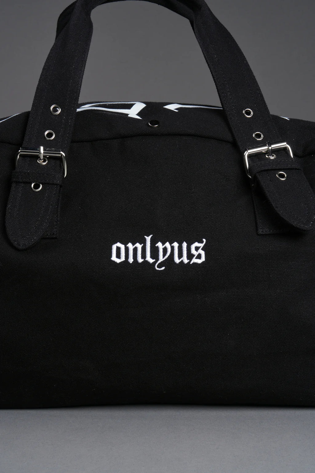 OUR MANTRA DUFFLE SHOULDER BAG IN BLACK