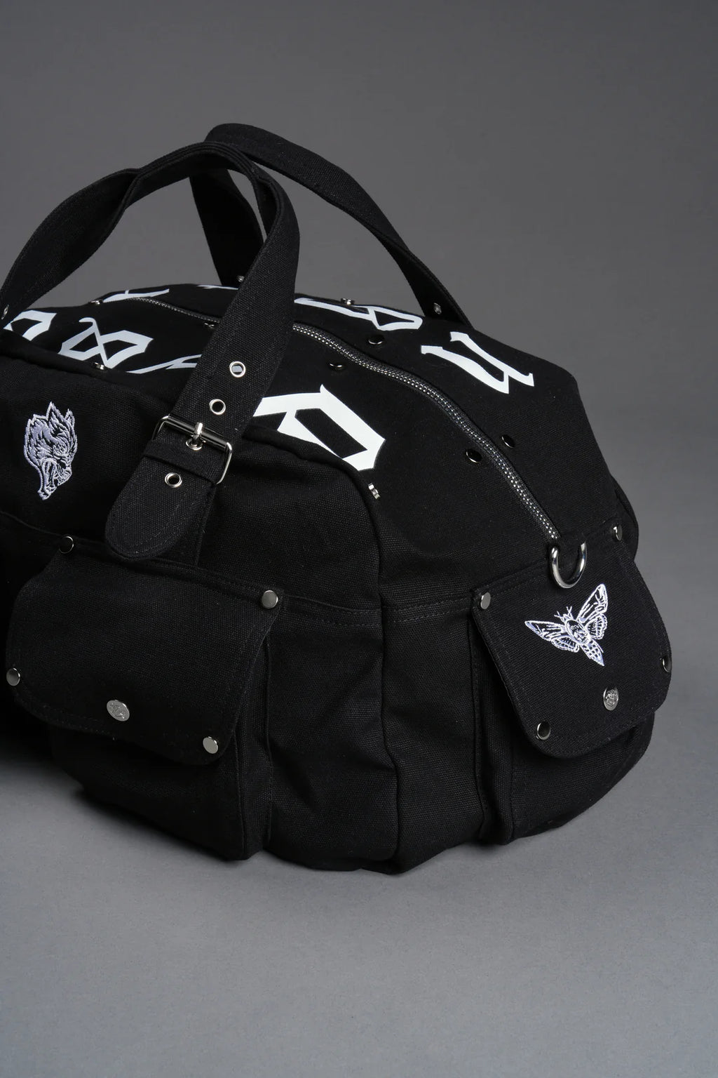 OUR MANTRA DUFFLE SHOULDER BAG IN BLACK