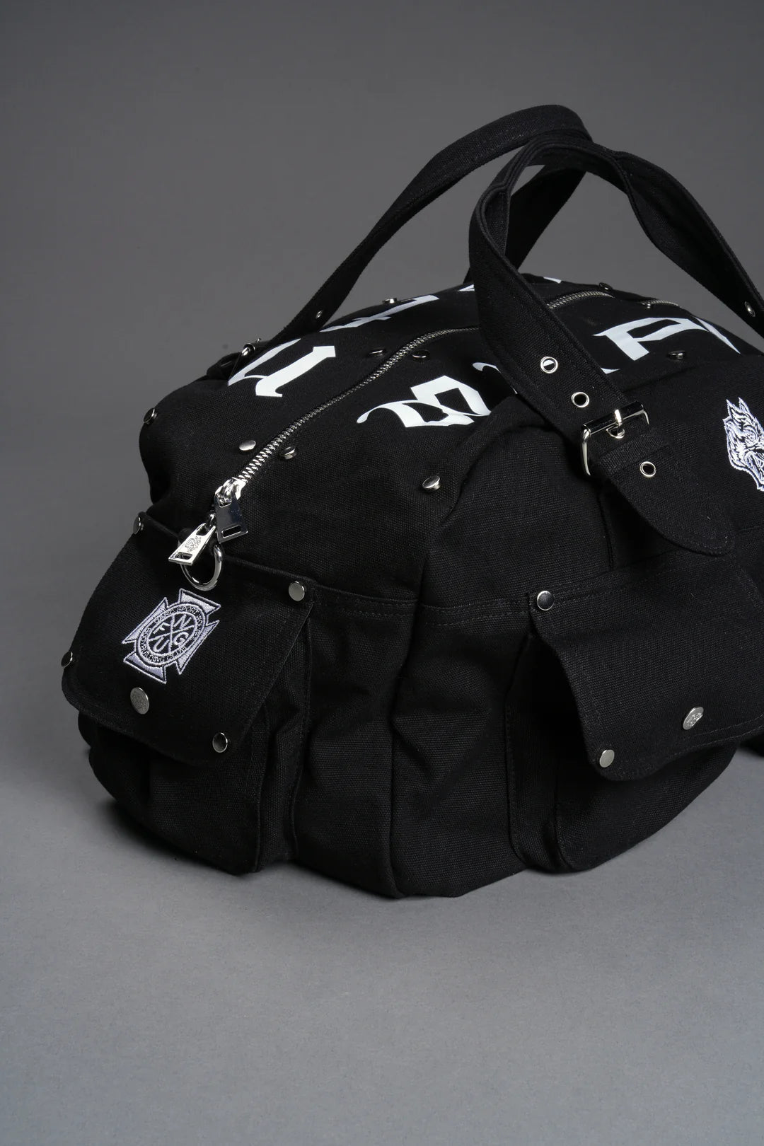 OUR MANTRA DUFFLE SHOULDER BAG IN BLACK