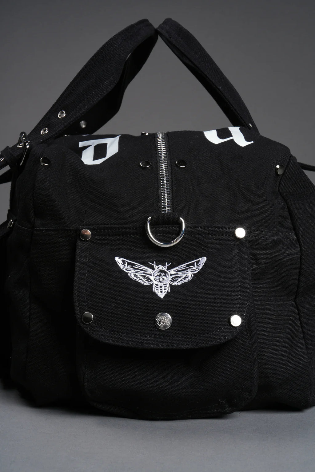 OUR MANTRA DUFFLE SHOULDER BAG IN BLACK