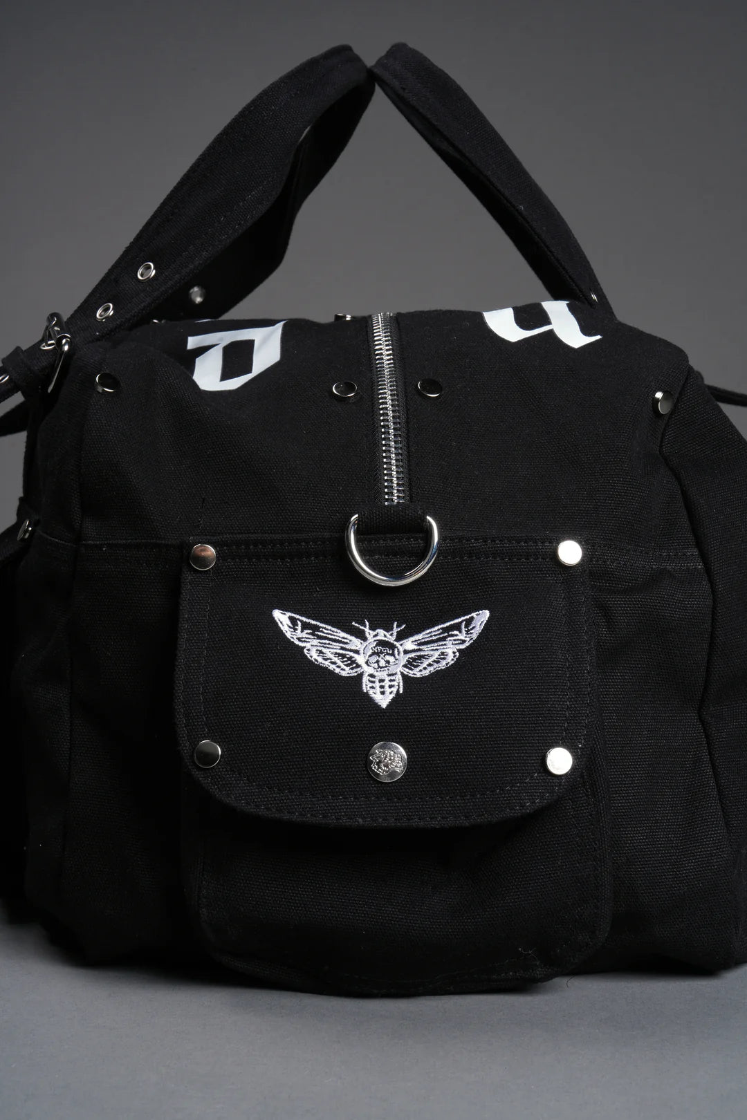 OUR MANTRA DUFFLE SHOULDER BAG IN BLACK
