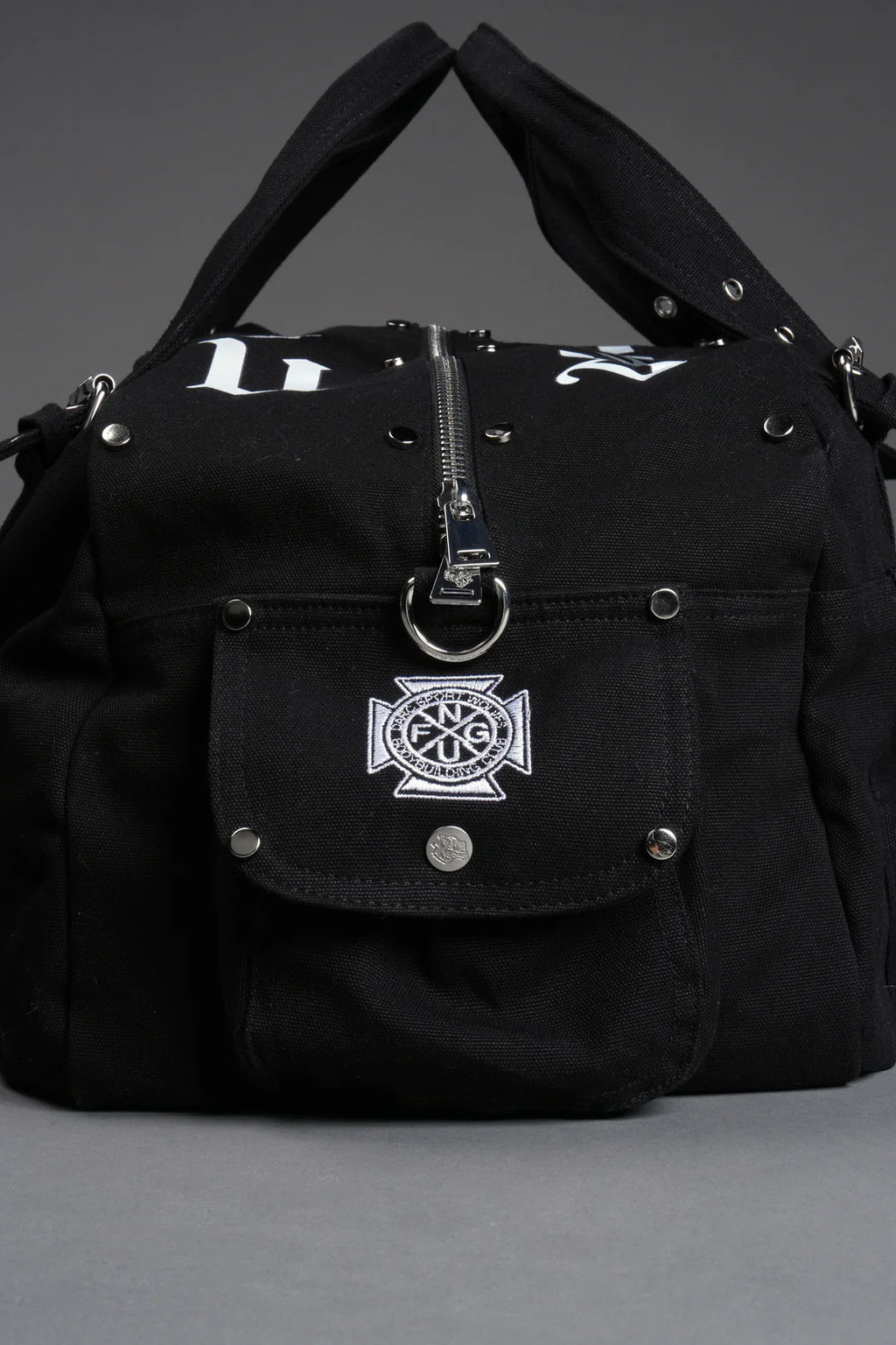 OUR MANTRA DUFFLE SHOULDER BAG IN BLACK
