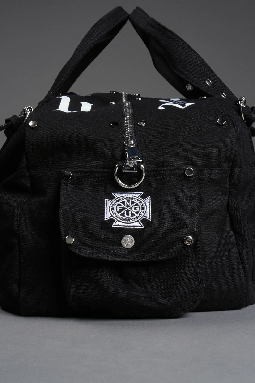 OUR MANTRA DUFFLE SHOULDER BAG IN BLACK