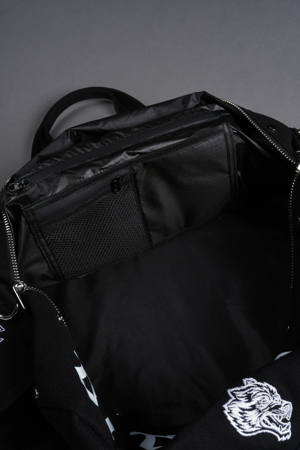 OUR MANTRA DUFFLE SHOULDER BAG IN BLACK