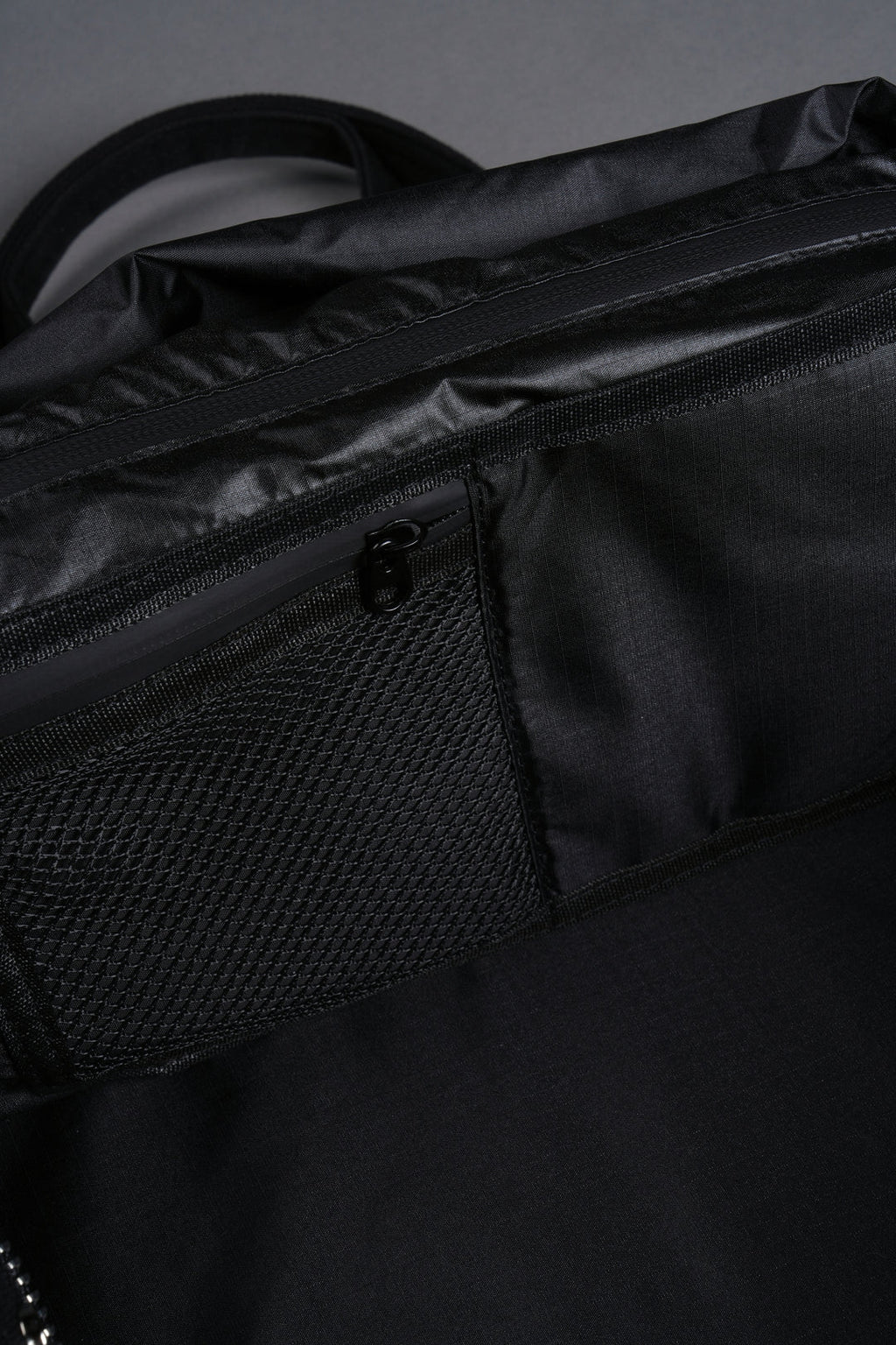 OUR MANTRA DUFFLE SHOULDER BAG IN BLACK