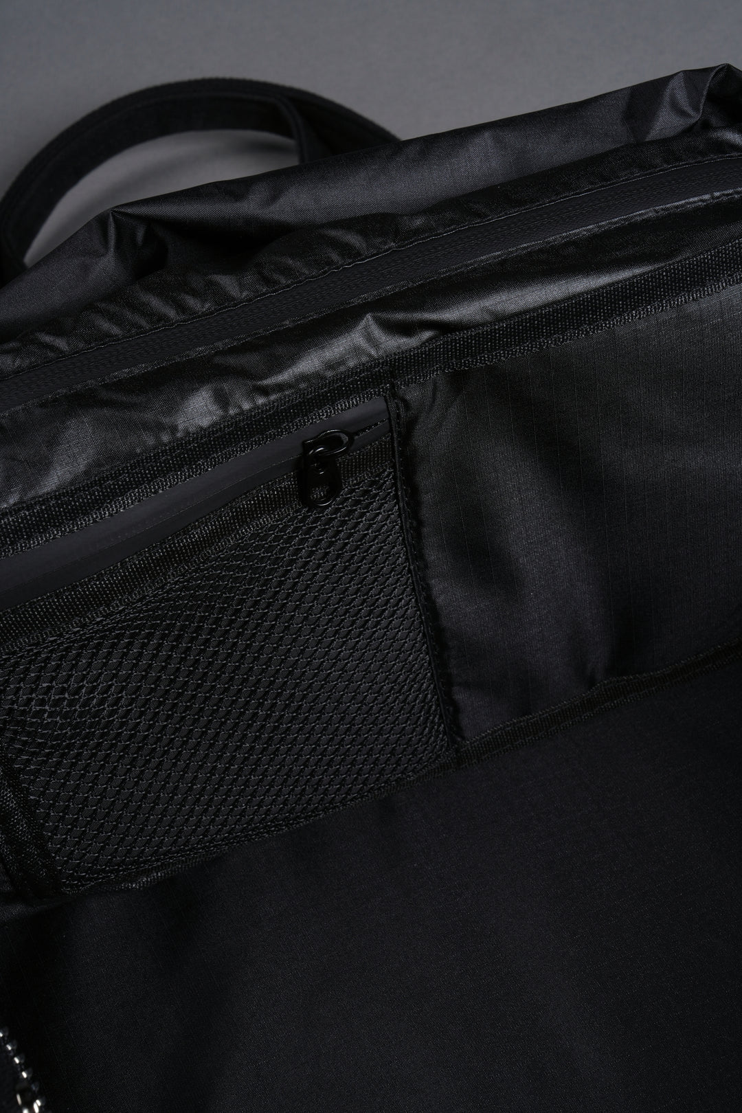 OUR MANTRA DUFFLE SHOULDER BAG IN BLACK