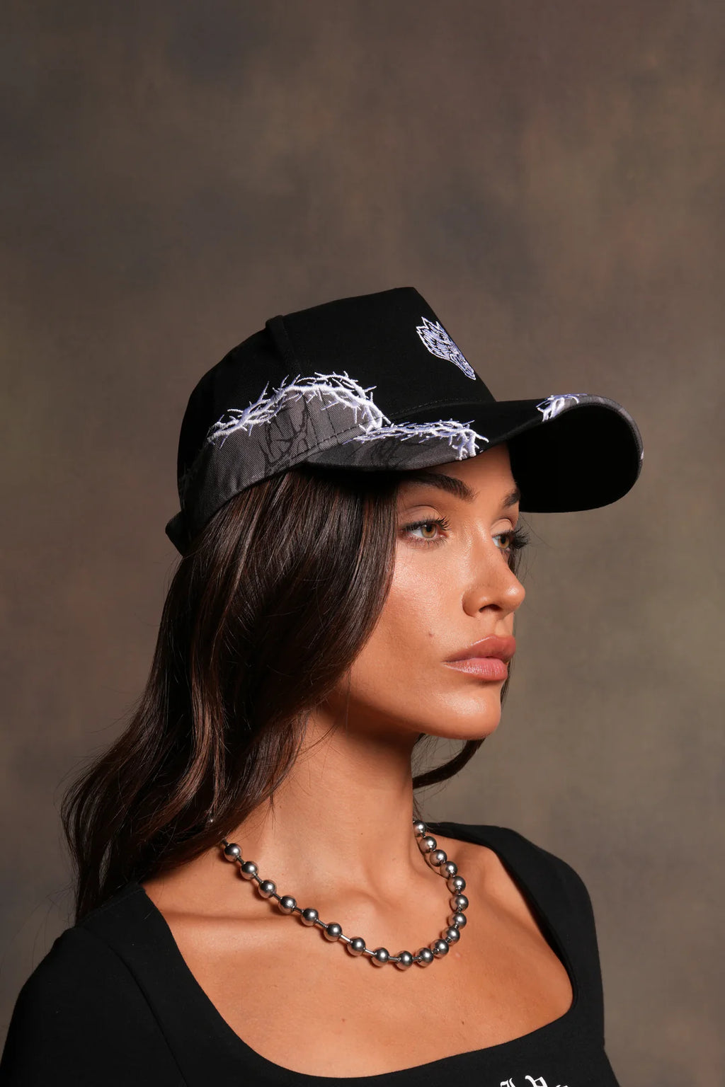 SCORCHED THORNS 5 PANEL HAT IN BLACK/BLOSSOM WOODLAND CAMO