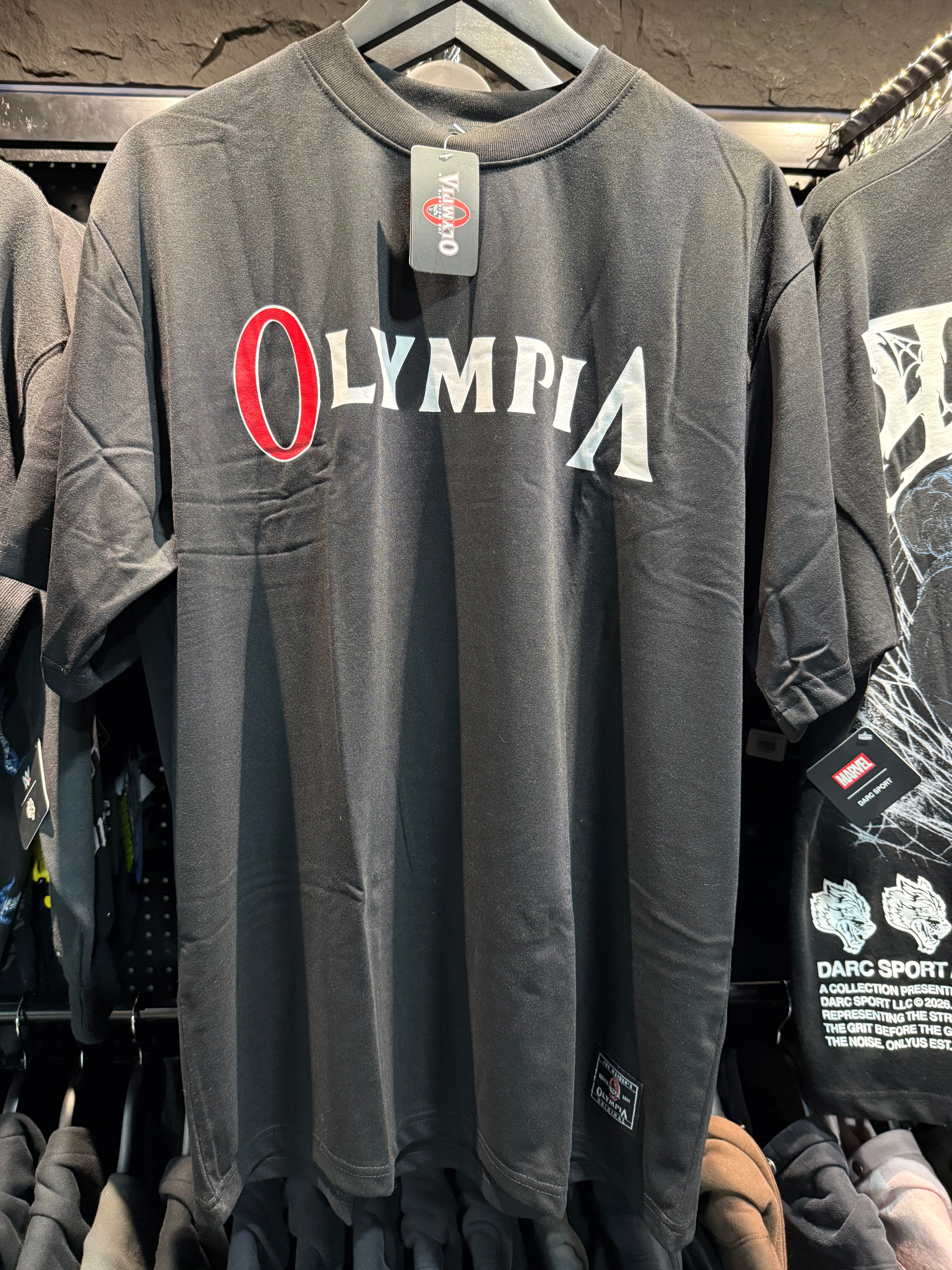 OLYMPIA PREMIUM VERTICLE BLACK OS TEE